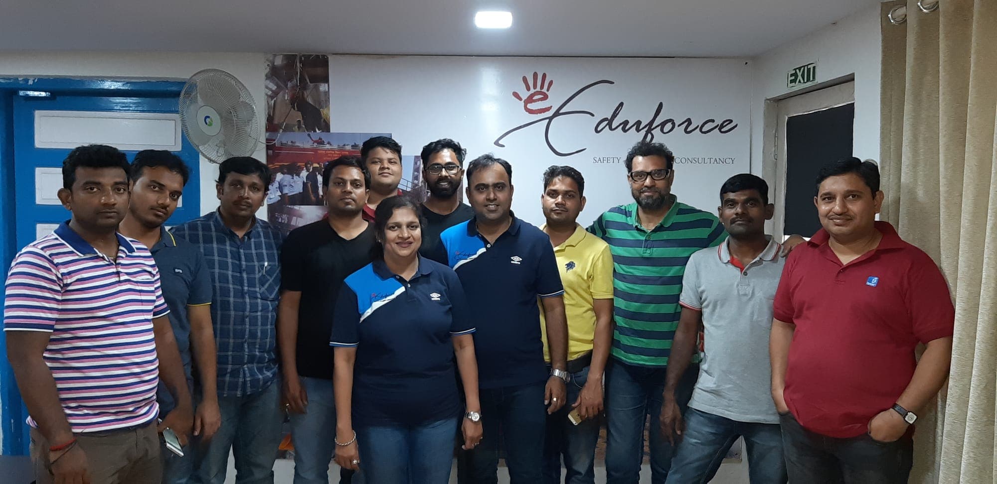 Participants of a first aid course standing together at the end of a session