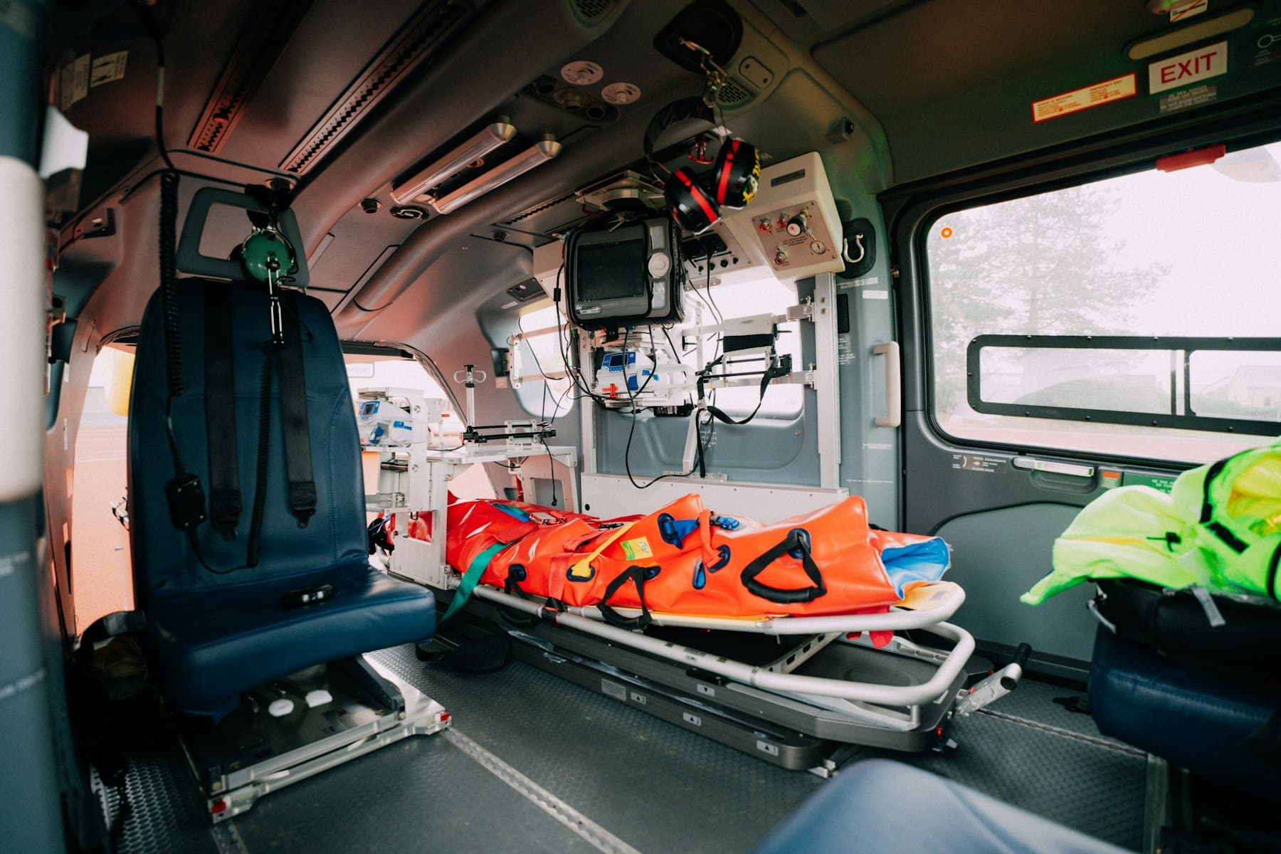 Industrial paramedic assessing a casualty during a site exercise